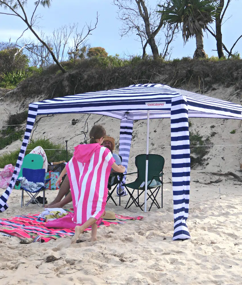 A family in a CoolCabana tent - the best beach shelter!